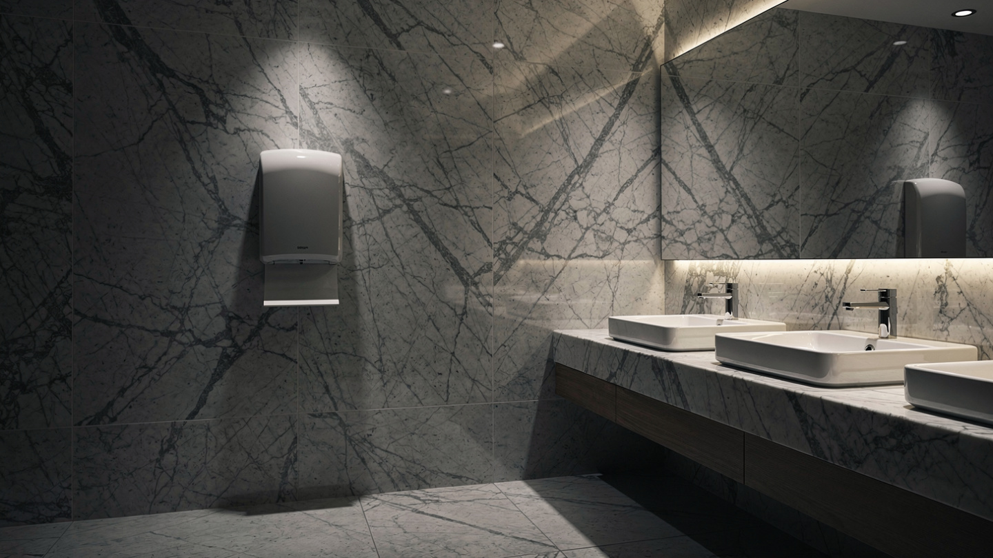 touch-free hand dryer in clean commercial bathroom